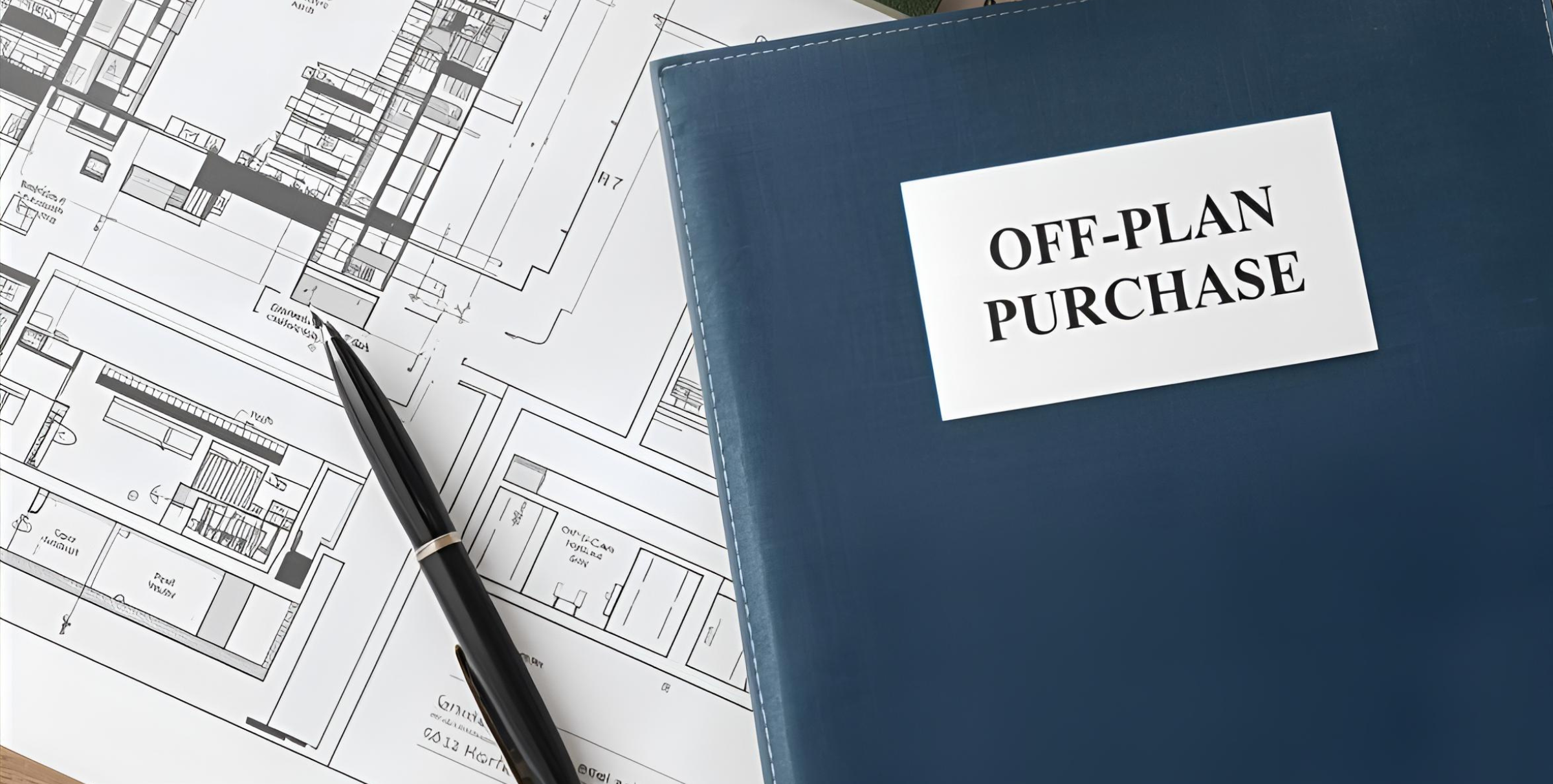 Legal risks of buying pre-selling or off-plan properties — contract and building plan on desk symbolizing real estate due diligence.